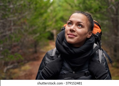 Portrait Of A Beautiful Hispanic Woman Hiking In The Pine Forest Alone, A Solo Expedition Camping Trip