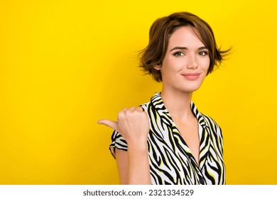 Portrait of beautiful lady showing news offer empty space billboard wear zebra print summer blouse isolated yellow color background - Shutterstock ID 2321334529