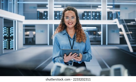 Portrait of a Beautiful Latin Female Wearing Smart Corporate Shirt and Glasses, Looking at Camera and Smiling. Businesswoman, Information Technology Manager, Robotics Engineering Specialist. - Shutterstock ID 2233202311
