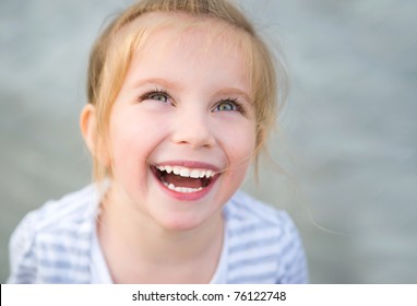 Portrait of a beautiful liitle girl close-up - Powered by Shutterstock