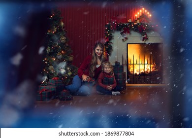 portrait of beautiful little girl with her mama in christmas environment - Shutterstock ID 1869877804