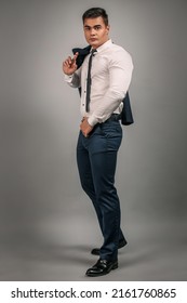 Portrait Of A Beautiful Man Guy Brunet In The Studio In A Black Classic Suit And Tie, Big Strongman