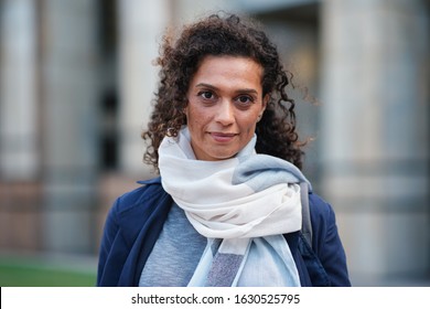 Portrait beautiful mature woman smiling confident independent female in city - Shutterstock ID 1630525795