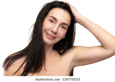 Portrait of beautiful middle aged woman on white background