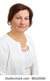Portrait of a beautiful middle aged woman against a white background.