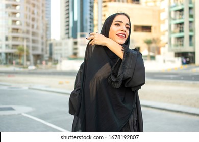 wearing abaya