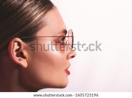 Portrait of beautiful model with close up glasses. Young woman, brunette girl with sunglasses, isolated, commercial poster  ready, studio 