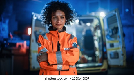 Portrait of Beautiful, Multiethnic, Female Paramedic Specialist on Late Night Shift. Heroic Empowering Woman Smiling and posing for Camera, Reporting for Duty to Save Lives and Treat Emergencies - Powered by Shutterstock