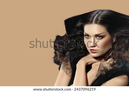 Portrait of beautiful mysterious brunette Halloween witch in party costume, Witchy allure: A young woman with dark hair captivates as an isolated sorceress.