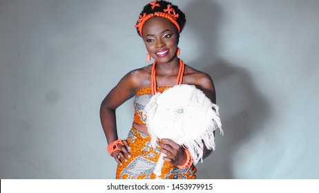 Portrait of beautiful Nigerian woman dressed in traditional Igbo attire 