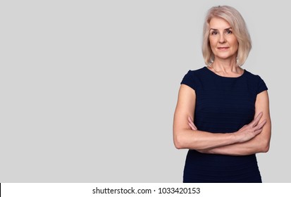 portrait of beautiful old woman smiling. 50s years old lady looking at camera. Anti aging makeup. isolated