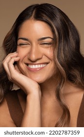 Portrait Of Beautiful Puerto Rican Woman In Her 20s Posing With Confidence On Neutral Background