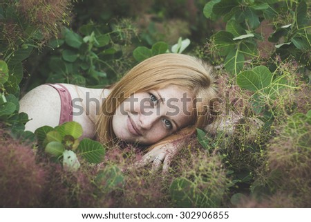 Close up portrait of happy blonde girl