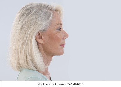 Portrait Of Beautiful Senior Woman Profile View