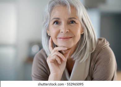 https://image.shutterstock.com/image-photo/portrait-beautiful-senior-woman-white-260nw-552965095.jpg