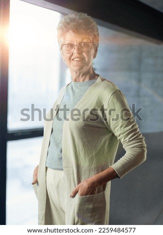 Similar – Image, Stock Photo Elderly woman in yellow top with a warm smile