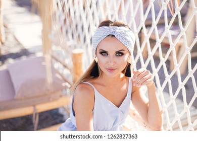 Portrait of beautiful sensual woman with turban. 
