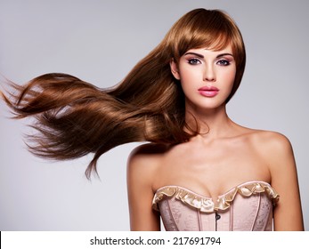 Portrait Of The Beautiful Sexy Woman With Long  Hair. Fashion Model With Straight Hairstyle