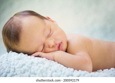 Portrait of Beautiful Sleeping Naked Newborn Baby