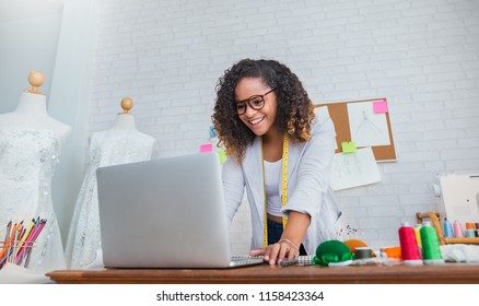 Portrait Beautiful Smile Designer Woman Work With Computer Tailer Fabric Fashion Small Business Workshop Office. Owner Entrepreneur Creative Girl In Textile Garment Business Job Startup Blog Concept
