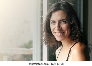 Portrait of beautiful smiling 35 years old woman