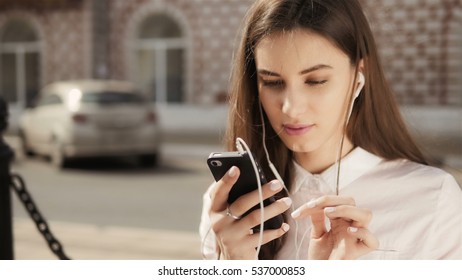 Portrait Of A Beautiful Teenage Student Girl Sitting With Copy Book And Studing. Sunny Summer Day. Modern  Casual Lifestyle. Woman  Note Pad.