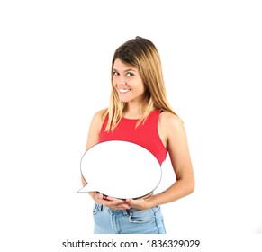 Portrait Of A Beautiful Teenager Girl Smiling While Holding A Blank Word Bubble Against A White Background