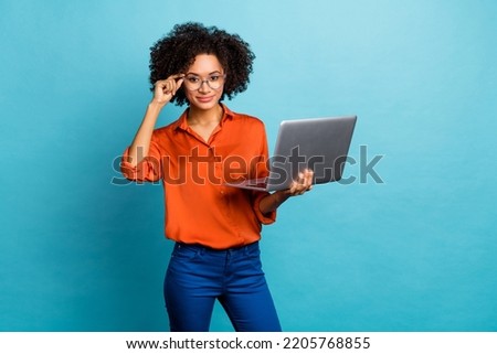 Similar – Image, Stock Photo Black woman in trendy attire wearing scarf isolated on yellow background