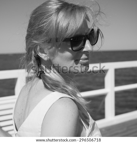 Similar – Portrait von einer jungen Frau mit Wind im Haar