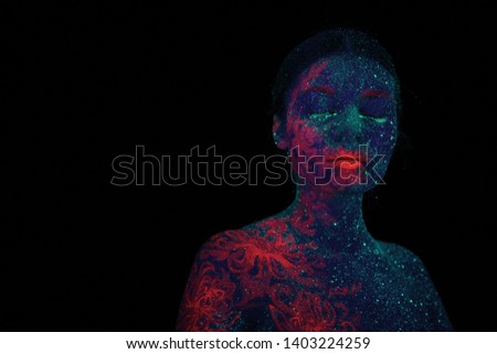 A portrait of a beautiful woman alien. Ultraviolet body art green night sky with stars and pink jellyfish.