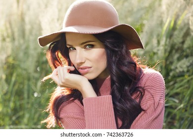 Portrait Of A Beautiful Woman In An Autumn Sweater.