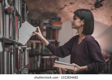 Portrait Of Beautiful Woman Bookshop Owner. Successful Independent Businesswoman, Owner Of A Book Shop