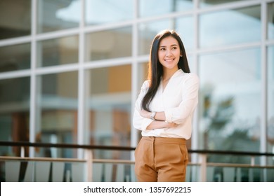 Portrait Of Beautiful Woman Business Executive Style In Downtown Urban Area