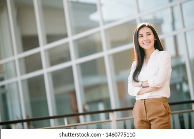 Portrait Of Beautiful Woman Business Executive Style In Downtown Urban Area