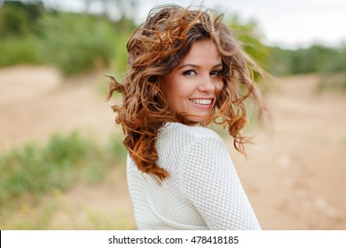 Portrait Of A Beautiful Woman With Flying Hair In The Wind, Summer, Closeup