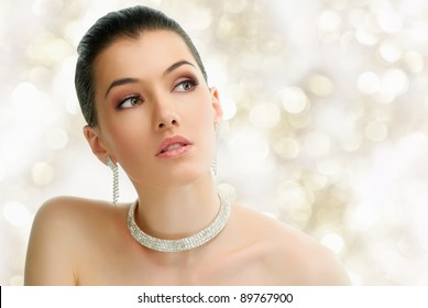 Portrait Of Beautiful Woman With Jewelry