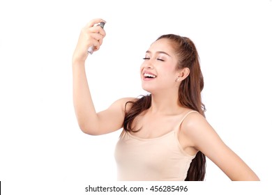 Portrait beautiful woman with mineral water spray.