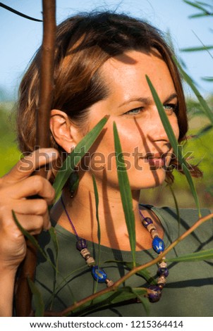 Similar – Foto Bild Portrait von einer jungen Frau im Bambus Dschungel