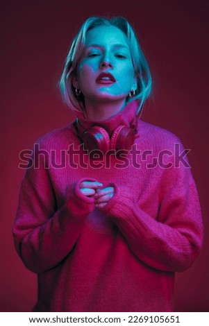 Similar – Young woman dancing and listening to music