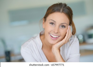 Portrait Of Beautiful Woman Relaxing At Home