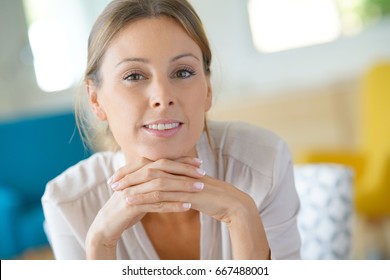 Portrait Of Beautiful Woman Relaxing At Home