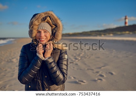 Similar – Pretty healthy woman enjoying a hike on a beach