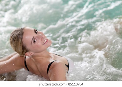 Portrait Of Beautiful Woman In Spa Jacuzzi