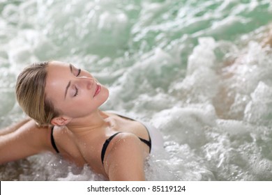 Portrait Of Beautiful Woman In Spa Jacuzzi