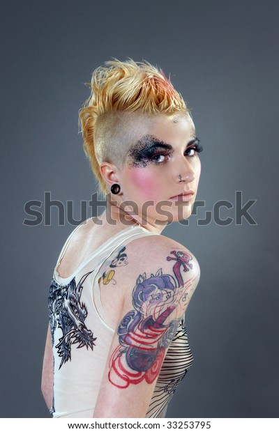 Portrait of beautiful\
woman with tattoo