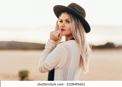 woman wearing a fedora