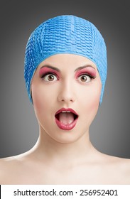 Portrait Of A Beautiful Woman Wearing A Swim Cap