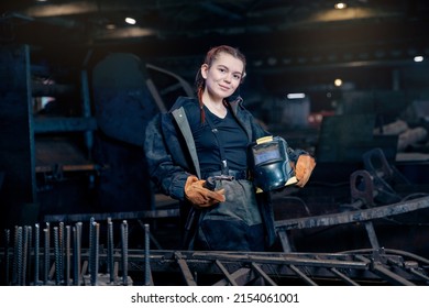 Portrait beautiful woman welder background industry factory workplace. - Powered by Shutterstock