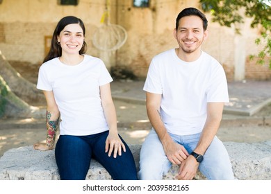 Portrait Of A Beautiful Woman And Young Man With Matching Prints On Their White T-shirts