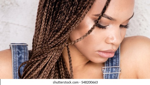 Portrait Of Beautiful Young African Girl With Braids, Studio Shot.